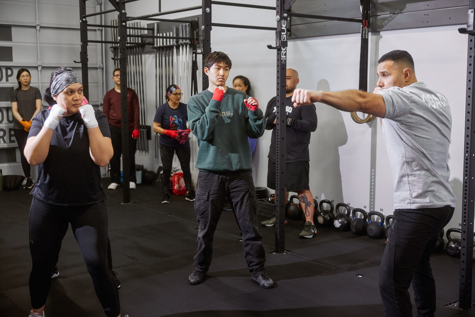 Coach giving an encouraging high-five to a beginner student